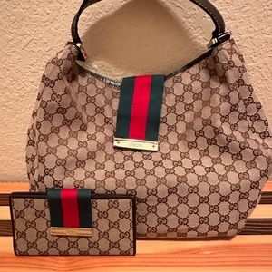 Gently used Signature Gucci Hobo handbag with checkbook wallet